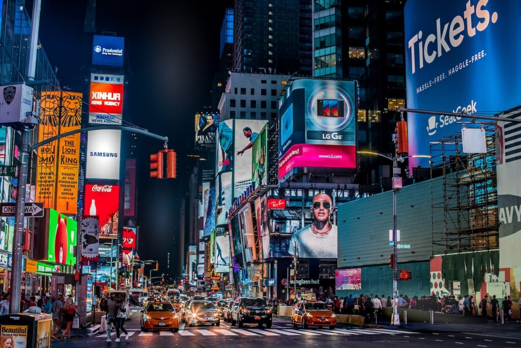 Outdoor billboard lit up at night in Kolkata